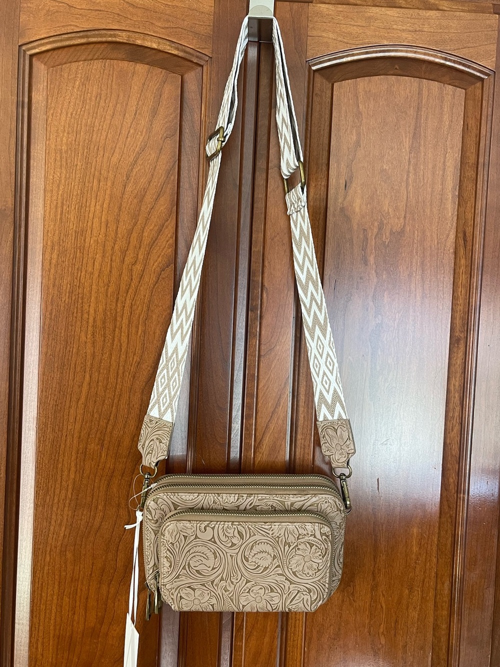Embossed Floral Crossbody Bag in Beige with Patterned Strap